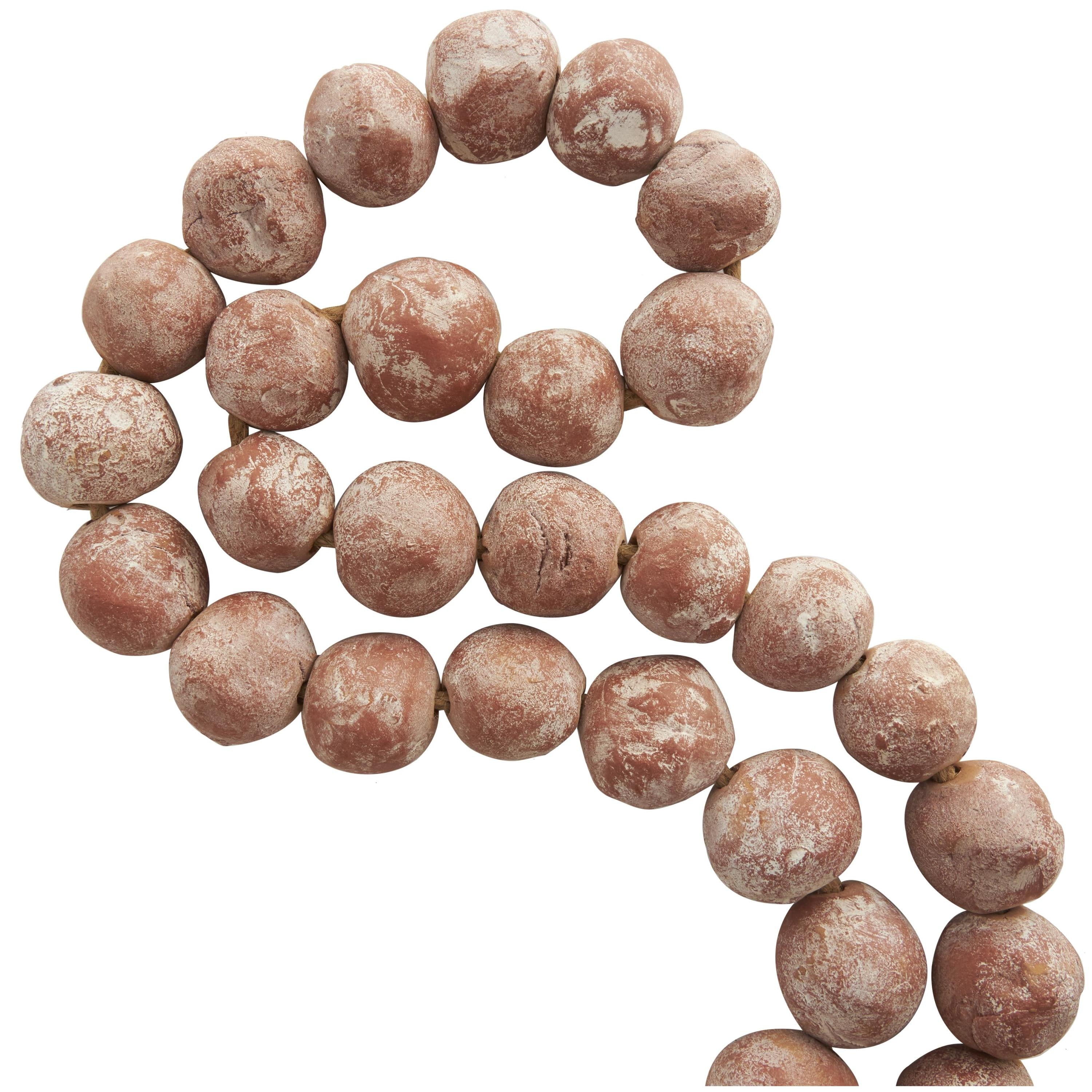 DecMode Handmade Round Intricately Shaped Large Distressed Orange Ceramic Garland with Tassel