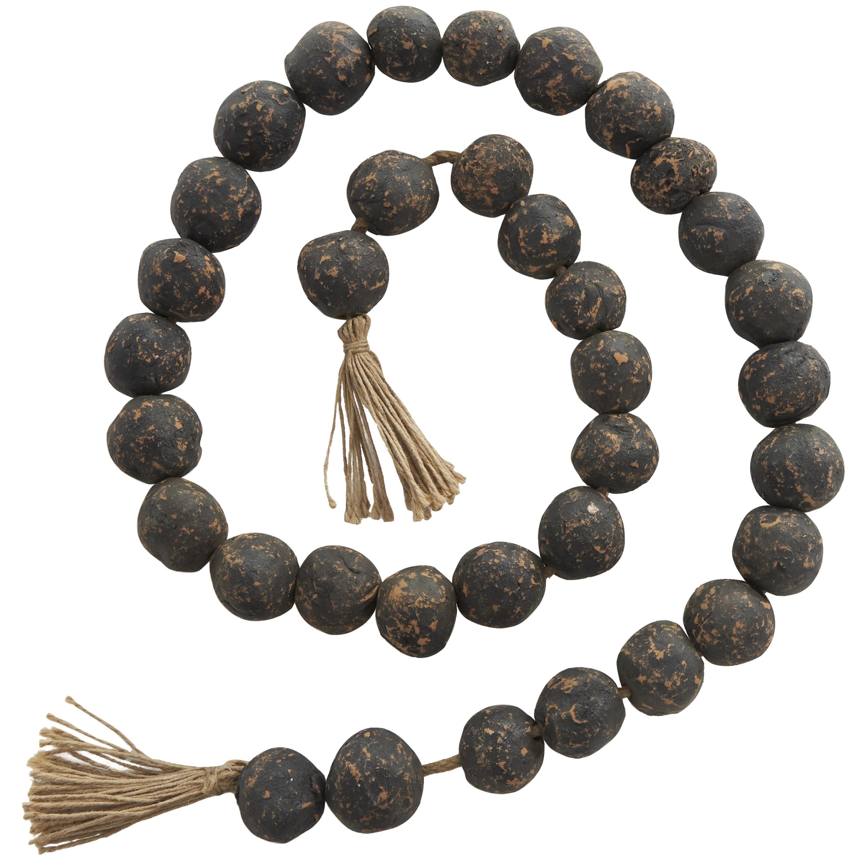 DecMode Handmade Round Intricately Shaped Large Distressed Orange Ceramic Garland with Tassel