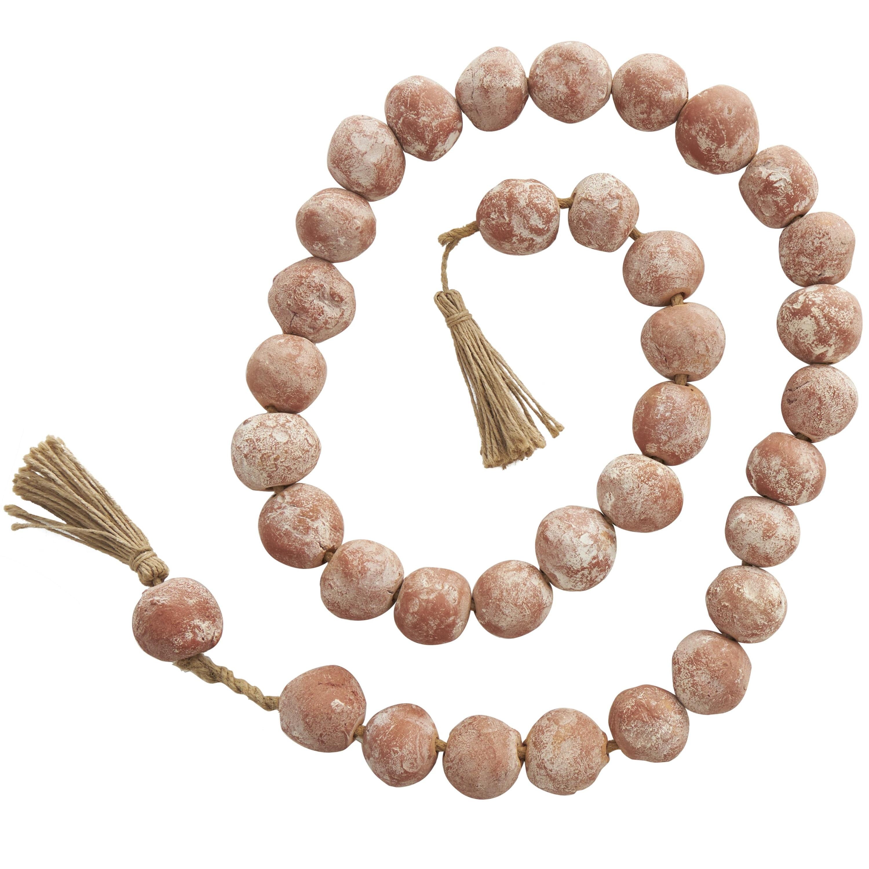 DecMode Handmade Round Intricately Shaped Large Distressed Orange Ceramic Garland with Tassel