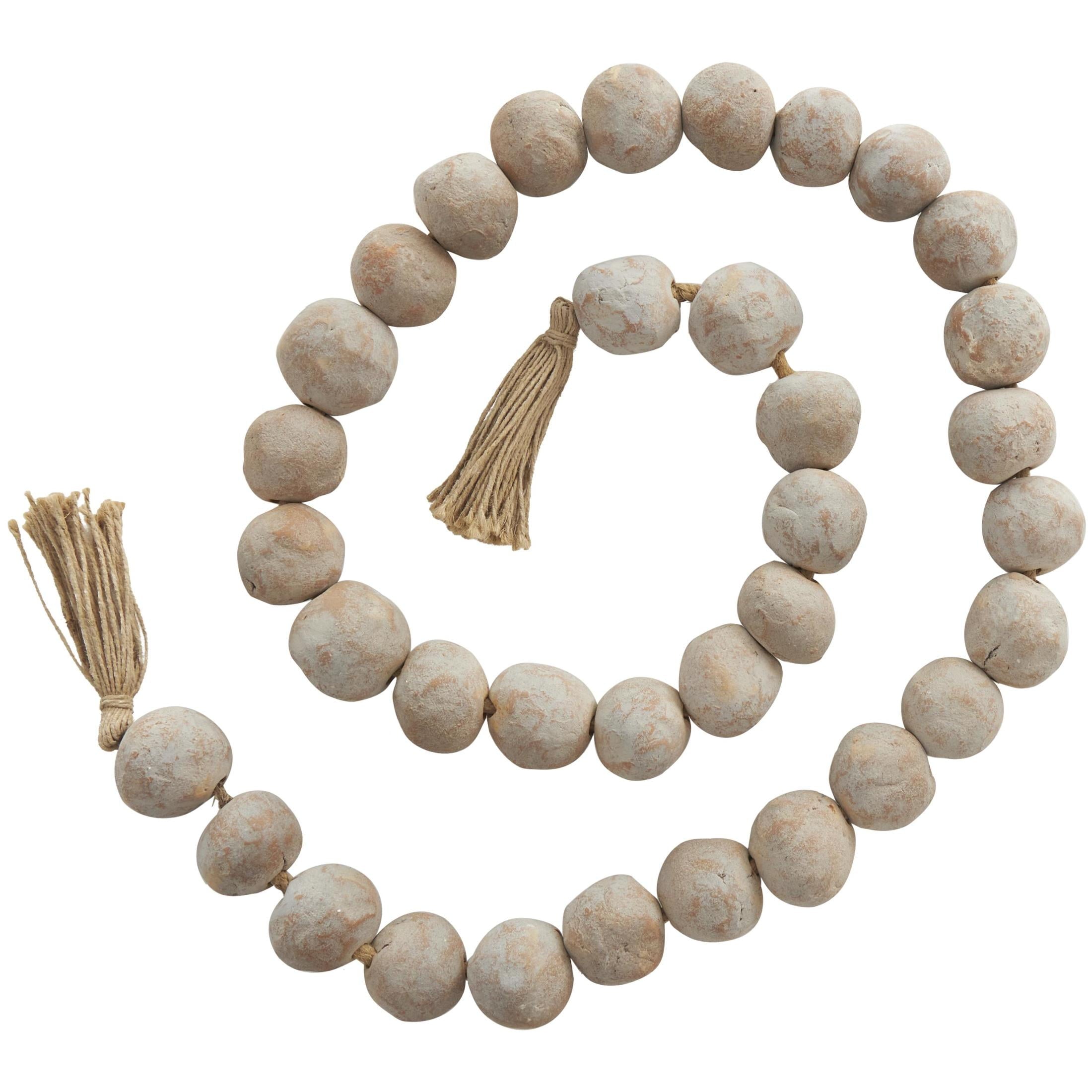 DecMode Handmade Round Intricately Shaped Large Distressed Orange Ceramic Garland with Tassel