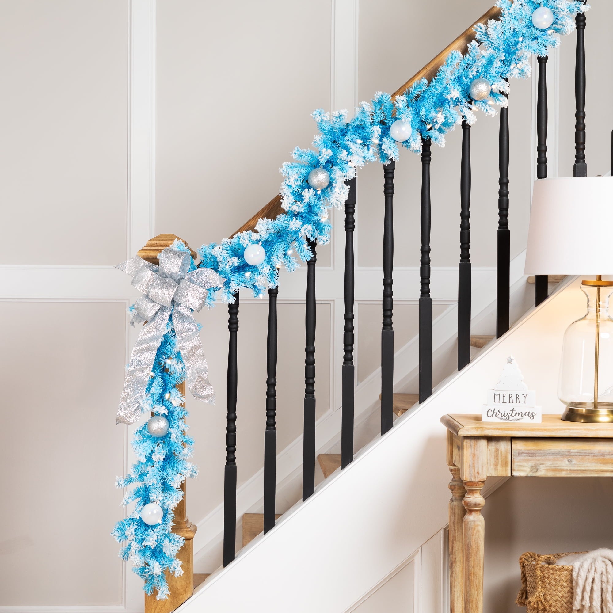 Northlight Pre-Lit Artificial Flocked Pine Christmas Garland - 9' - Sky Blue - Clear Lights