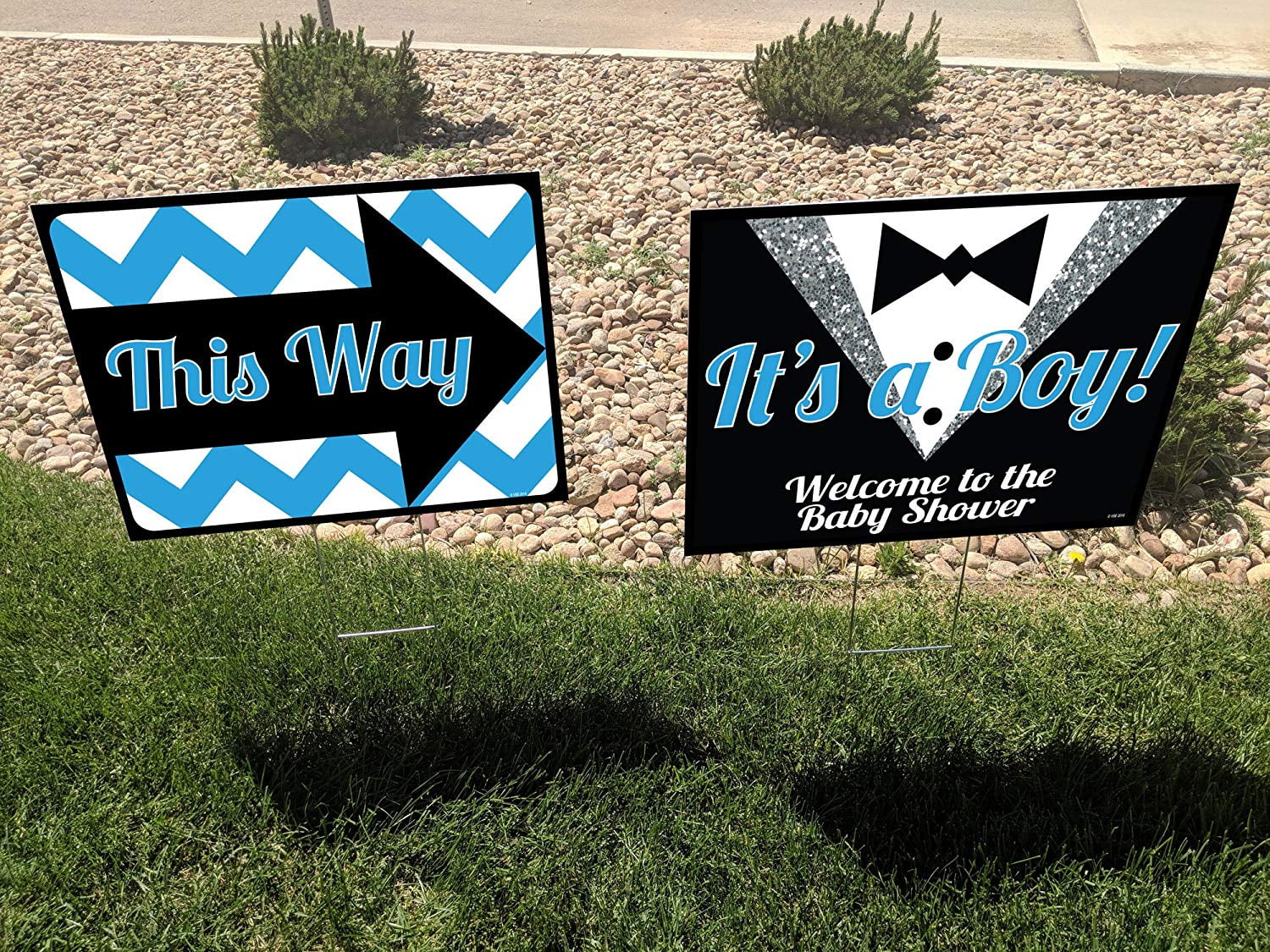 18x24 "It's A Boy" double sided Lawn Sign Baby Shower Kit with 6x24 H-stakes. Brightly colored Blue, Black, and Digitally Printed Silver Glitter on white lawn sign. Includes Directional Arrow sign