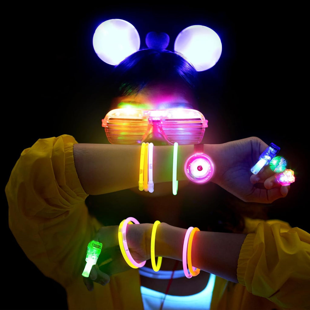 Mocoosy 103Pcs Glow in the Dark Party Supplies Light Up Party Favors LED Neon Halloween Toys Glow Sticks Bulk With Glow Sticks, Finger Lights, Led Glasses,Jelly Rings, Light Up Bracelets &Headbands